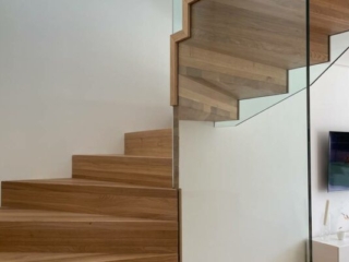 Faltwerk-Wendeltreppe Glasgeländer